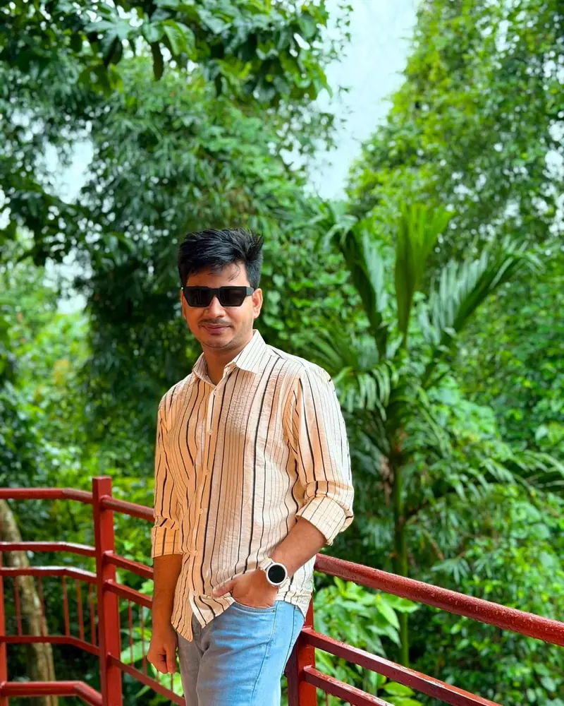 Naim Bin Hasan, freelance full-stack web developer, in a tea garden in Bangladesh