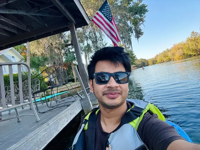 Naim Bin Hasan kayaking on a Florida spring river.